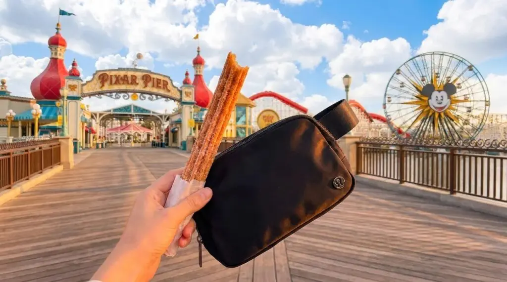 Lululemon belt bag at disneyland california adventure with a churro in hand