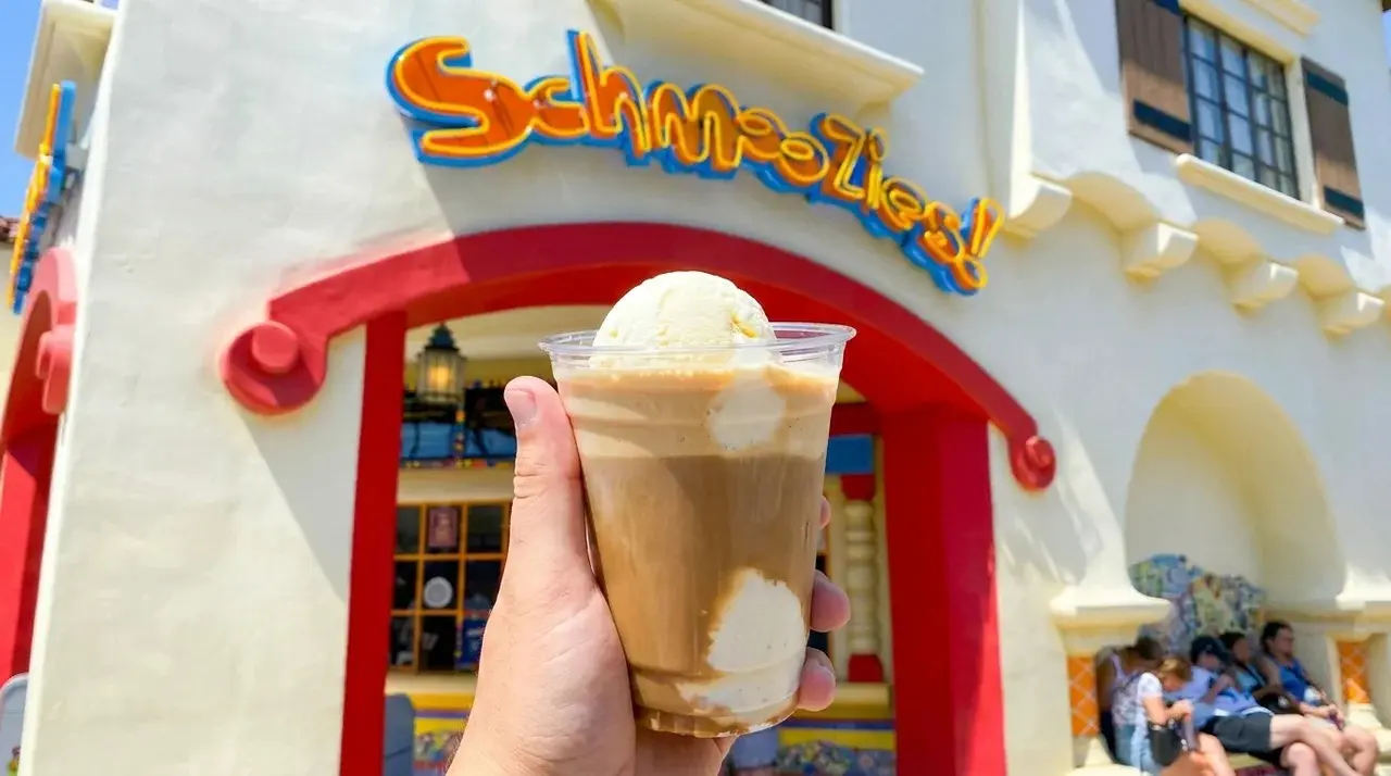 Schmoozies at California Adventure Affogato in front of the storefront.