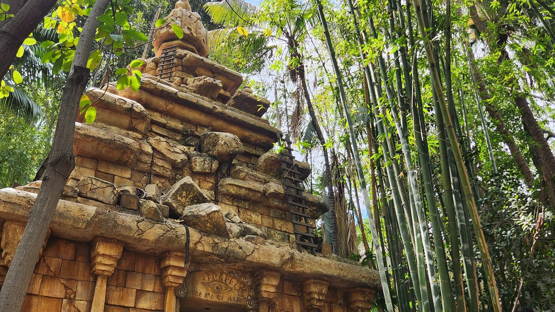 Real photo of the Indiana Jones Adventure temple exterior at Disneyland, stone facade and Temple of the Forbidden Eye doorway in Adventureland