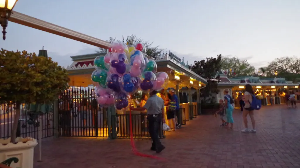 Disneyland park entrance in Anaheim with balloons near the gates