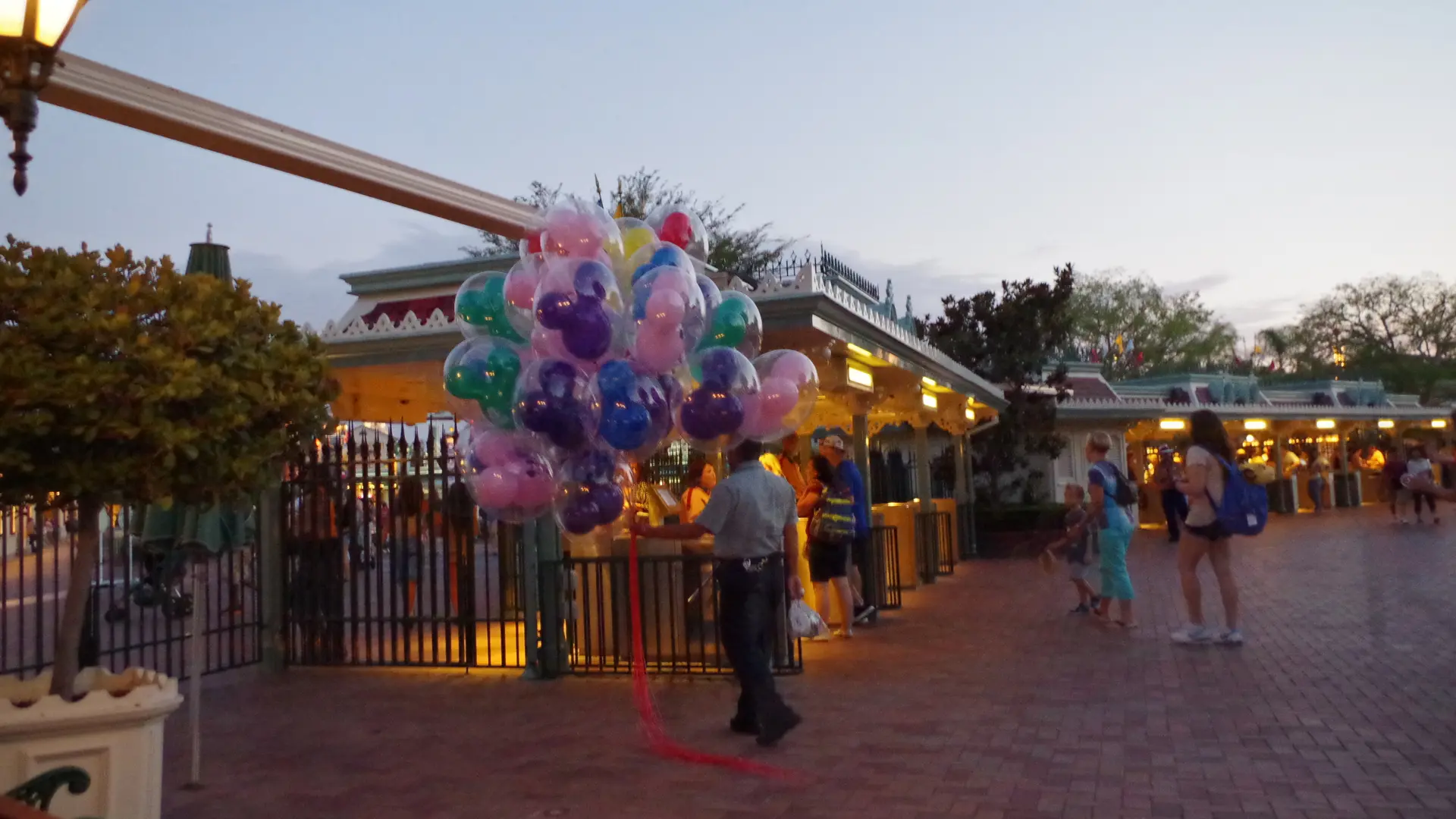 Disneyland park entrance in Anaheim with balloons near the gates