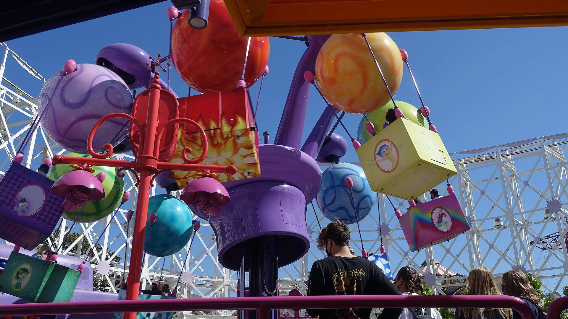 Inside Out Emotional Whirlwind Memory Movers spinning above Pixar Pier at Disney California Adventure